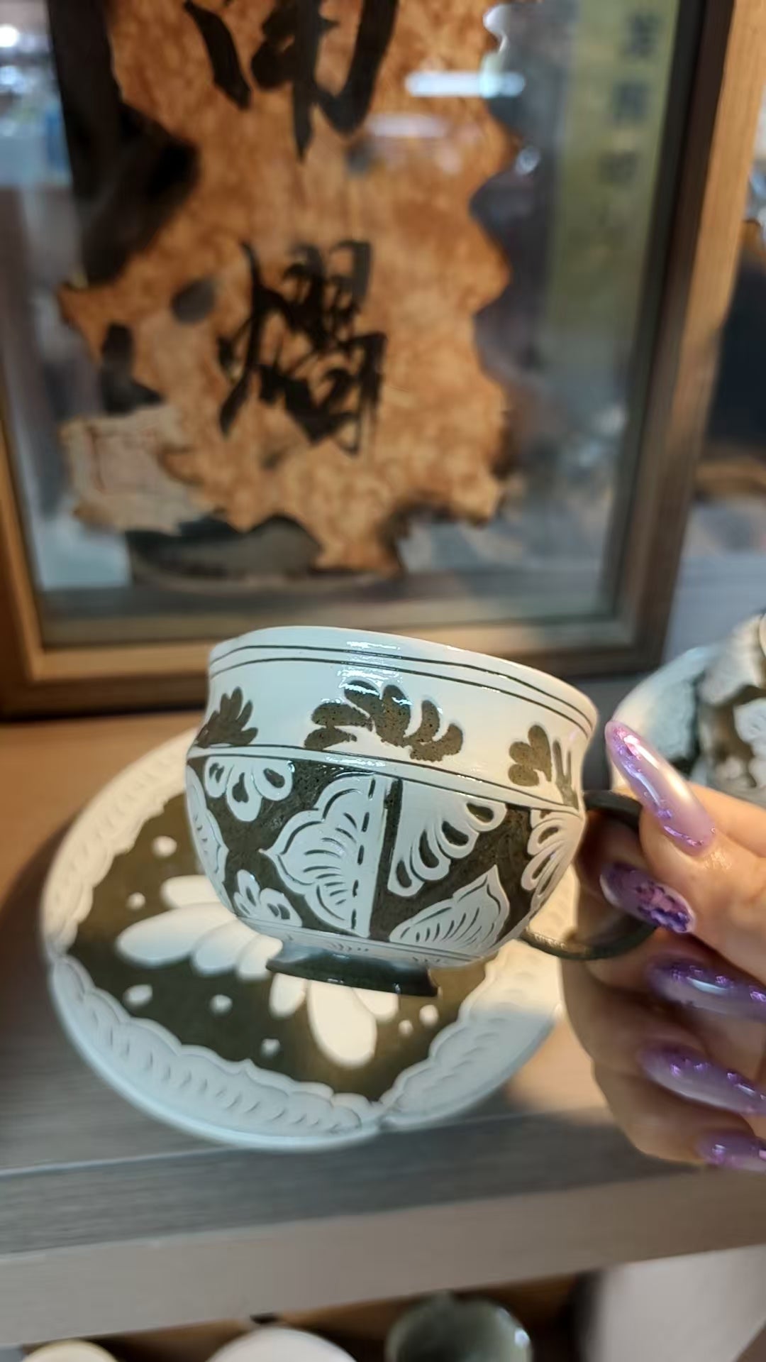 Hand-Carved Floral Coffee Cup and Saucer