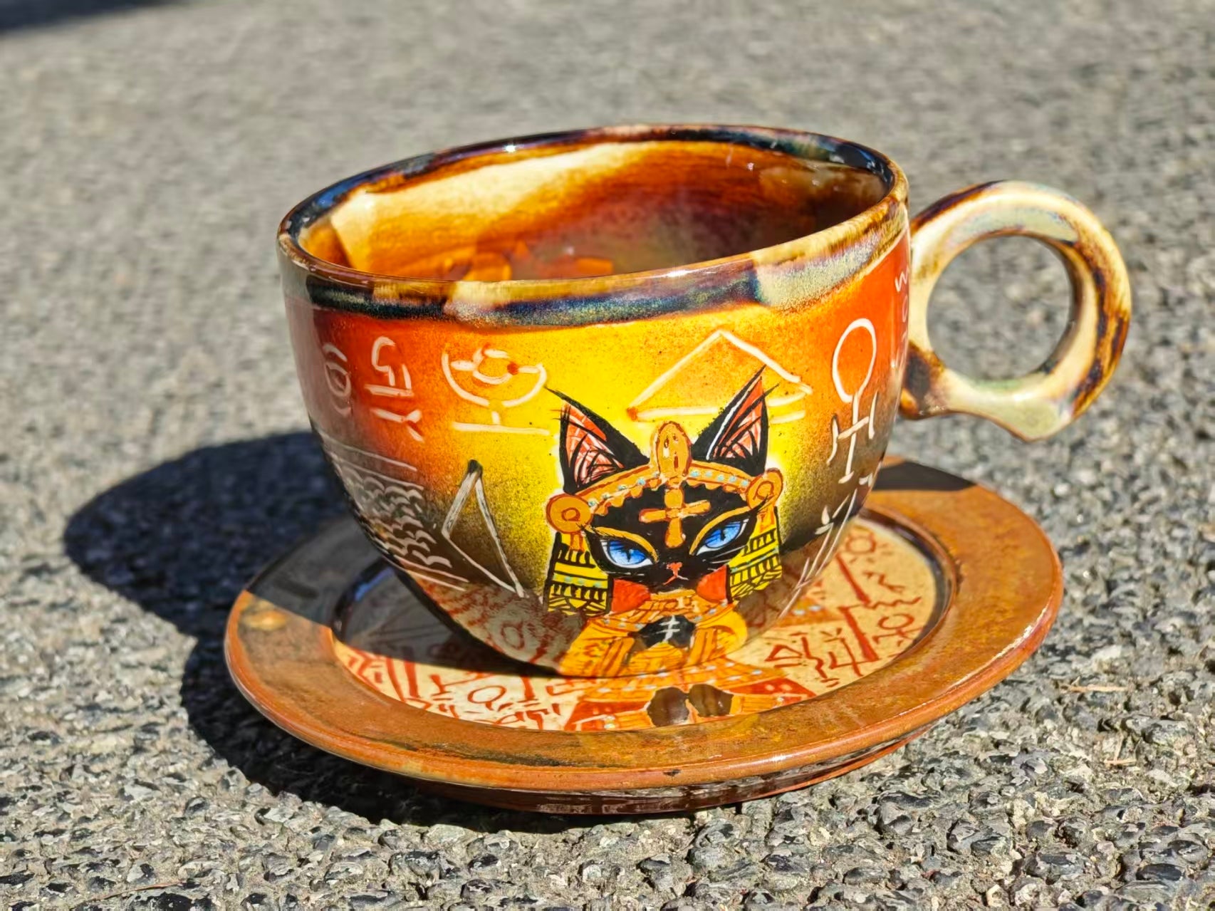 Cat motif ceramic cup as a pet-inspired ceramic reference